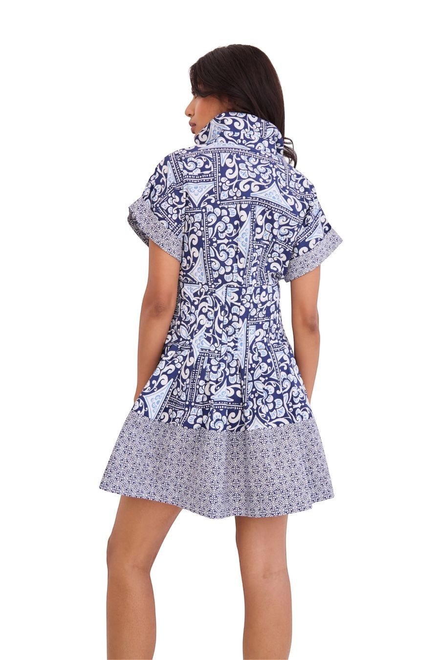 Bunny and Babe Winnetka Nash Mini Dress in Hart Tile Navy. Fit-and-flare shirtdress with functional placket, pockets, and decorative hem.